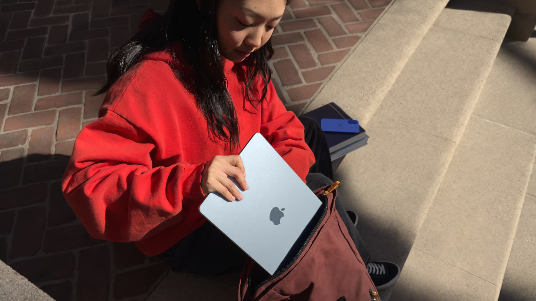 108110915 1741133362982 Apple MacBook Air lifestyle on the go